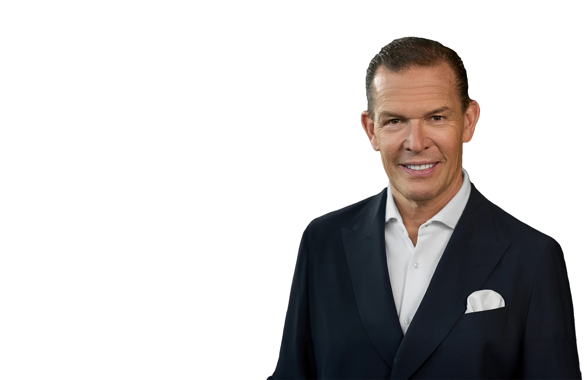 Daniel Grieder in camel-colored suit cropped (Photo)